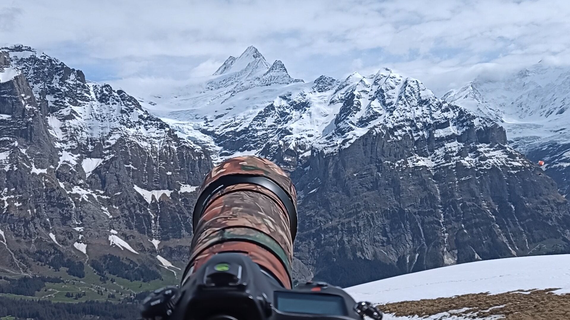 Load video: Swiss mountains from camera view. Camera lens where the magic happens.